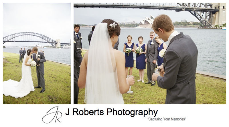 Popping champagne with the bridal party at Blues Point - Sydney wedding photography 